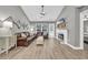 Living room with brown leather couches, fireplace and hardwood floors at 184 Retreat Pl., Little River, SC 29566