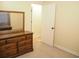 Bedroom with dresser and mirror, access to hallway at 187 Stephen Dr., Hemingway, SC 29554