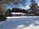 Brick ranch home with snow covered yard at 187 Stephen Dr., Hemingway, SC 29554