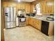 Kitchen with stainless steel appliances and wood cabinets at 187 Stephen Dr., Hemingway, SC 29554