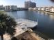 Community deck overlooking a lake with seating and picnic tables at 1919 Spring St. # B11, North Myrtle Beach, SC 29582