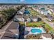 Aerial view of the community, highlighting the pool and pond at 1943 Bent Grass Dr. # H, Myrtle Beach, SC 29575