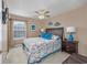 Bright bedroom featuring a comfy bed and ceiling fan at 1943 Bent Grass Dr. # H, Myrtle Beach, SC 29575