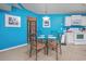 Kitchen dining area with glass-top table and four chairs at 1943 Bent Grass Dr. # H, Myrtle Beach, SC 29575