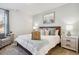 Main bedroom with wood framed bed and calming decor at 195 Talladega Dr. # 430, Myrtle Beach, SC 29579