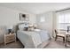 Cozy bedroom with striped bedding and workspace at 195 Talladega Dr. # 430, Myrtle Beach, SC 29579