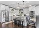 Bright kitchen with white cabinets, stainless steel appliances, and island at 200 53Rd Ave. N # 501, North Myrtle Beach, SC 29582