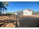 House back view with covered patio and fenced yard at 230 Kellys Cove Dr., Conway, SC 29526