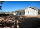 House back view with covered patio and fenced yard at 230 Kellys Cove Dr., Conway, SC 29526