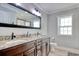 Elegant bathroom with double vanity and granite countertops at 230 Kellys Cove Dr., Conway, SC 29526