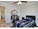 Cozy bedroom featuring a vintage dresser and ceiling fan at 230 Kellys Cove Dr., Conway, SC 29526