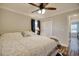 Main bedroom with king-size bed and ceiling fan at 230 Kellys Cove Dr., Conway, SC 29526