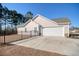 House exterior showcasing a garage and fenced yard at 230 Kellys Cove Dr., Conway, SC 29526