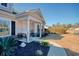 Inviting front porch with a charming bench and landscaping at 230 Kellys Cove Dr., Conway, SC 29526