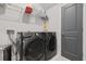 Laundry room with washer, dryer, and shelving at 2360 Goldfinch Dr., Myrtle Beach, SC 29577