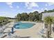 Resort-style swimming pool with lounge chairs and umbrellas at 2360 Goldfinch Dr., Myrtle Beach, SC 29577