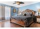 Spacious bedroom with wood flooring, large bed, and ceiling fan at 2409 Royal Oak Circle, North Myrtle Beach, SC 29582