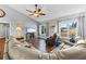 Relaxing living room with hardwood floors, comfortable seating, and fireplace at 2409 Royal Oak Circle, North Myrtle Beach, SC 29582