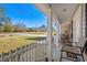 Front porch with white picket fence and seating area at 2579 Allen Dew Rd., Conway, SC 29527