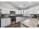 Modern kitchen with stainless steel appliances and granite countertops at 2579 Allen Dew Rd., Conway, SC 29527