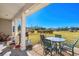 Covered patio with outdoor seating and a gas grill at 2579 Allen Dew Rd., Conway, SC 29527