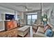 Comfortable living room with ocean view and hardwood floors at 2600 N Ocean Blvd. # 1410, Myrtle Beach, SC 29577