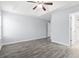 Main bedroom with gray walls, wood-look floors, and ceiling fan at 293 Foxpath Loop, Myrtle Beach, SC 29588