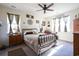 Cozy bedroom with a metal bed frame and decorative wall art at 2998 Skylar Dr., Myrtle Beach, SC 29577