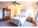 Bedroom with wooden furniture, a ceiling fan, and a double bed at 2998 Skylar Dr., Myrtle Beach, SC 29577