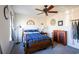 Well-lit bedroom with a full-size bed and ceiling fan at 2998 Skylar Dr., Myrtle Beach, SC 29577