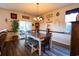 Farmhouse style dining room with a large table and bench seating at 2998 Skylar Dr., Myrtle Beach, SC 29577