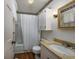 Clean bathroom with a shower/tub combo and updated vanity at 300 Mcarthur St., Tabor City, NC 28463