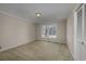 Well-lit bedroom with neutral carpeting and a closet at 300 Mcarthur St., Tabor City, NC 28463