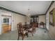 Traditional dining room with wood table, chairs, and hutch at 300 Mcarthur St., Tabor City, NC 28463