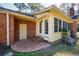 Brick house with a sunroom and patio area at 300 Mcarthur St., Tabor City, NC 28463