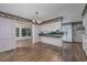 Kitchen with breakfast bar, white cabinets, and green countertops at 300 Mcarthur St., Tabor City, NC 28463