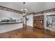 Kitchen boasts white cabinets, green countertops, and a built-in hutch at 300 Mcarthur St., Tabor City, NC 28463