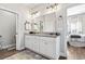 Bathroom with white vanity, granite countertop, and updated fixtures at 308 Turning Pines Loop, Myrtle Beach, SC 29579