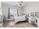 Main bedroom with a large bed, a vanity, and plenty of natural light at 308 Turning Pines Loop, Myrtle Beach, SC 29579