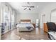 Large main bedroom with hardwood floors and a ceiling fan at 308 Turning Pines Loop, Myrtle Beach, SC 29579