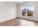 Spacious bedroom with large window and hardwood flooring at 3304 Candytuft Dr., Conway, SC 29526