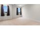 Well-lit bedroom with neutral colored walls and carpet at 3304 Candytuft Dr., Conway, SC 29526