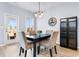 Dining room with four chairs, a dark table, and access to a patio at 3304 Candytuft Dr., Conway, SC 29526