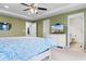 Main bedroom with ceiling fan, en-suite bathroom, and ample space at 3304 Candytuft Dr., Conway, SC 29526