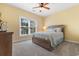 Bedroom with a queen bed and dresser at 3714 Old Pointe Circle, North Myrtle Beach, SC 29582