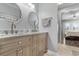 Elegant bathroom with double sinks, marble countertops, and large mirrors at 403 36Th Ave. N, North Myrtle Beach, SC 29582