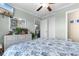 Bedroom with dresser, mirror, and coastal-themed bedding at 403 36Th Ave. N, North Myrtle Beach, SC 29582