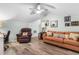 Relaxing bonus room featuring a leather recliner and orange couch at 403 36Th Ave. N, North Myrtle Beach, SC 29582