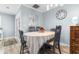 Charming dining room featuring a round table and four chairs at 403 36Th Ave. N, North Myrtle Beach, SC 29582