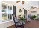 Relaxing front porch with rocking chairs, offering a view of the waterway at 403 36Th Ave. N, North Myrtle Beach, SC 29582